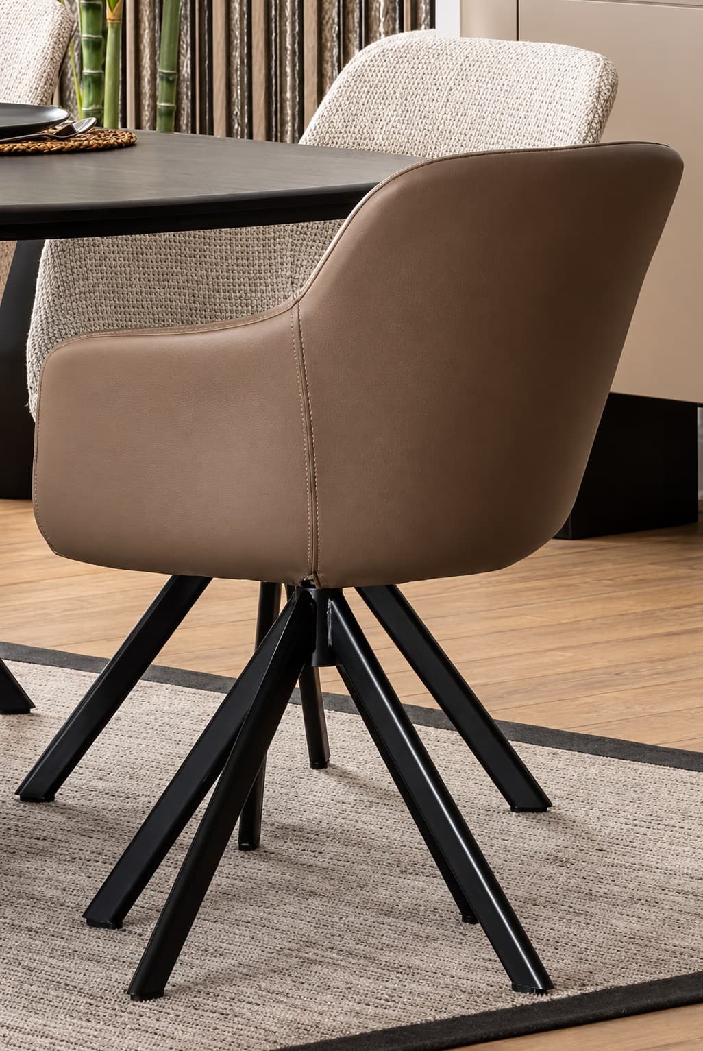 Vira swivel chairs around a round table